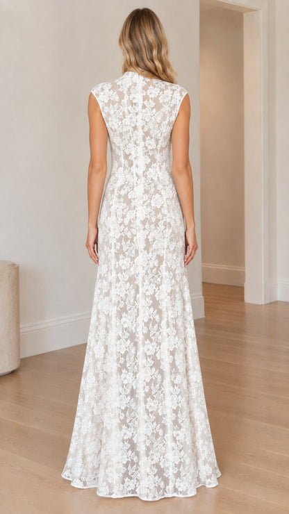 Model wearing white floral lace maxi dress back view