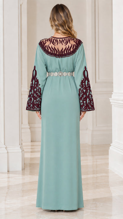 Back view of Sage Green caftan dress highlighting embroidered illusion back yoke