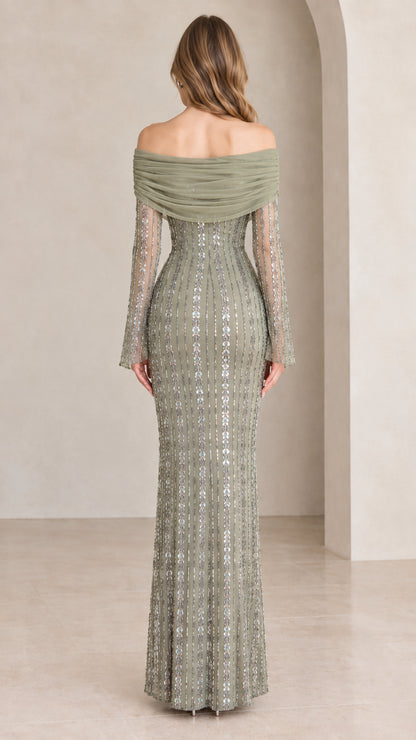 Back view of model showcasing draped back neckline and sequin detailing