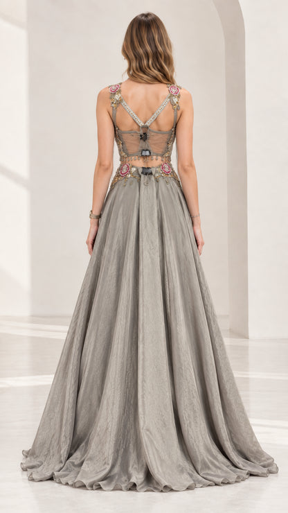 Back view of silver grey evening set showing illusion mesh back and zipper detail