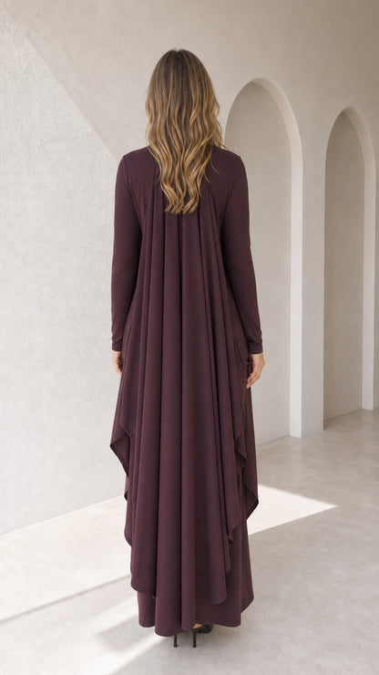Back view of plum maxi dress displaying elegant cape drape detail