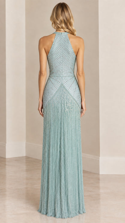 Back view of model in Sage Green halter beaded gown with open back detail