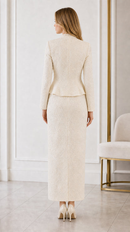 Back view of cream tailored peplum jacket and column maxi skirt