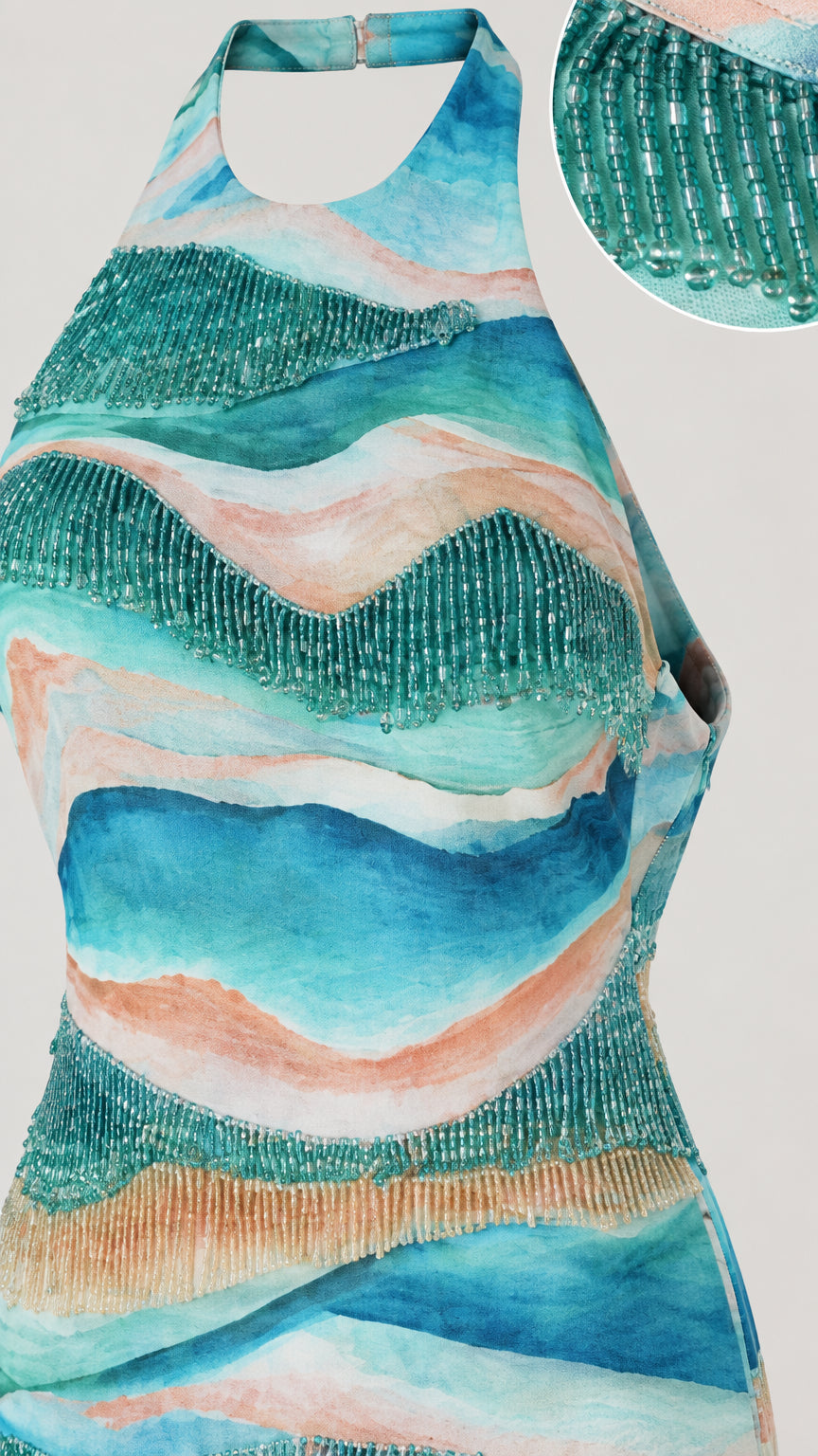 Close-up detail of halter neckline and intricate beaded fringe wave trim