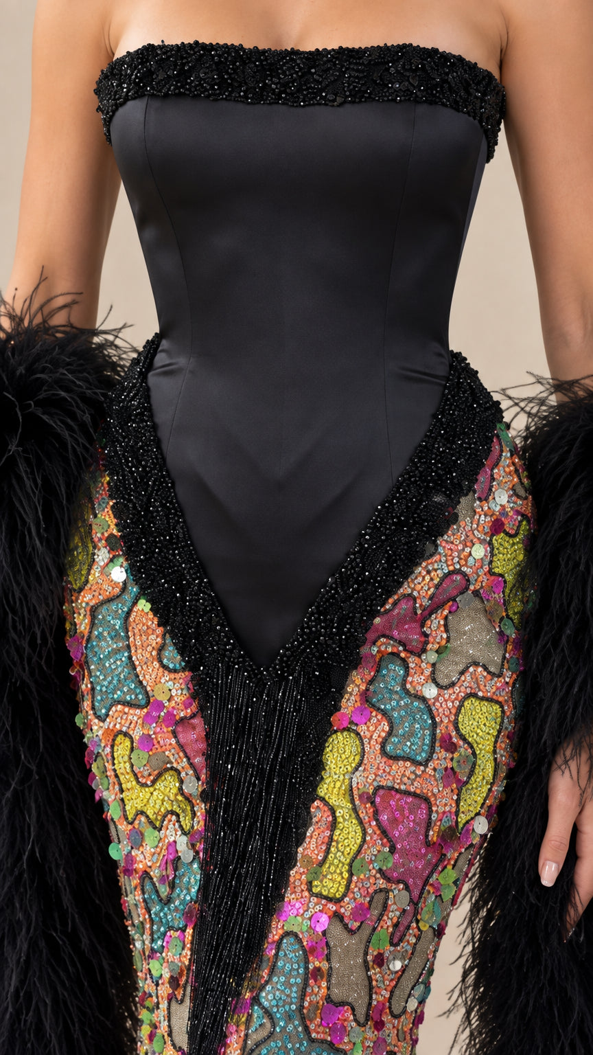 Close-up detail of beaded trim, corset bodice, and multicolor sequin skirt