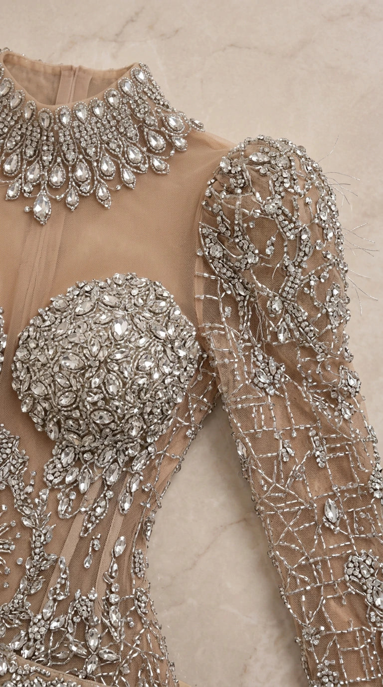 Close-up detail of jeweled mock collar and rhinestone sweetheart bustier