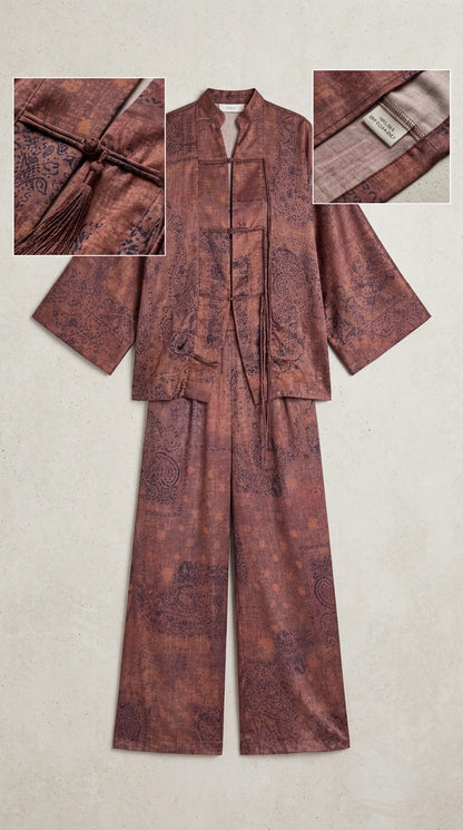 Flat lay view showing Dusty Mauve two-piece pant set with frog knot closures and fabric detail