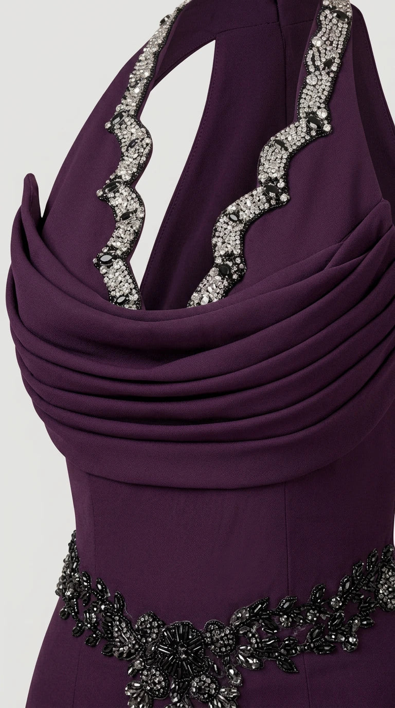 Close-up detail of draped cowl neckline with intricate rhinestone and bead embellishment
