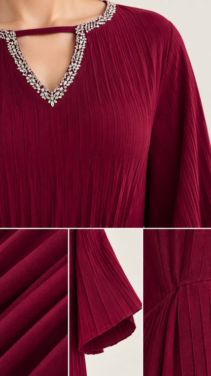 Close-up detail of sparkling rhinestone cutout neckline and pleated flare sleeves