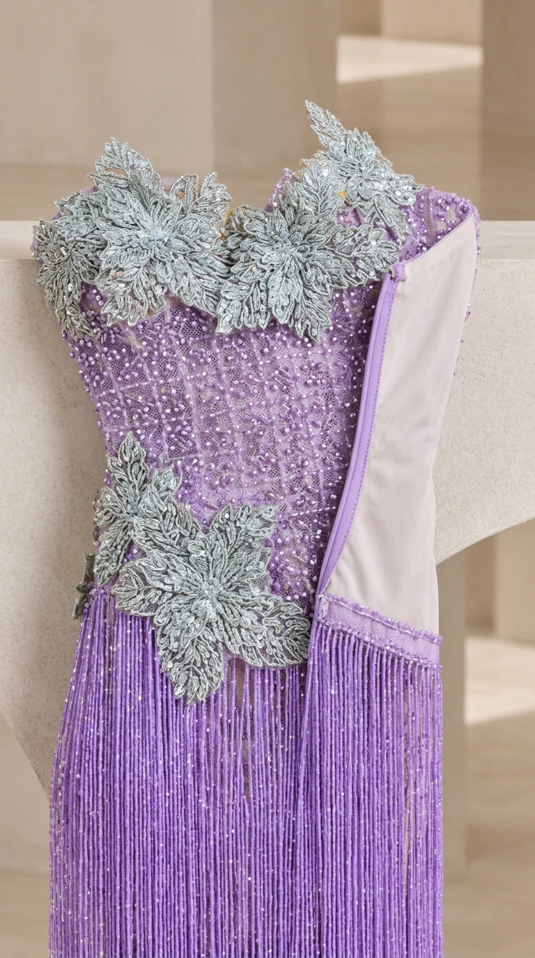 Close-up detail of lavender bodice featuring 3D floral embroidery and beaded texture