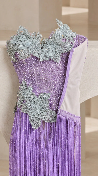 Close-up detail of lavender bodice featuring 3D floral embroidery and beaded texture