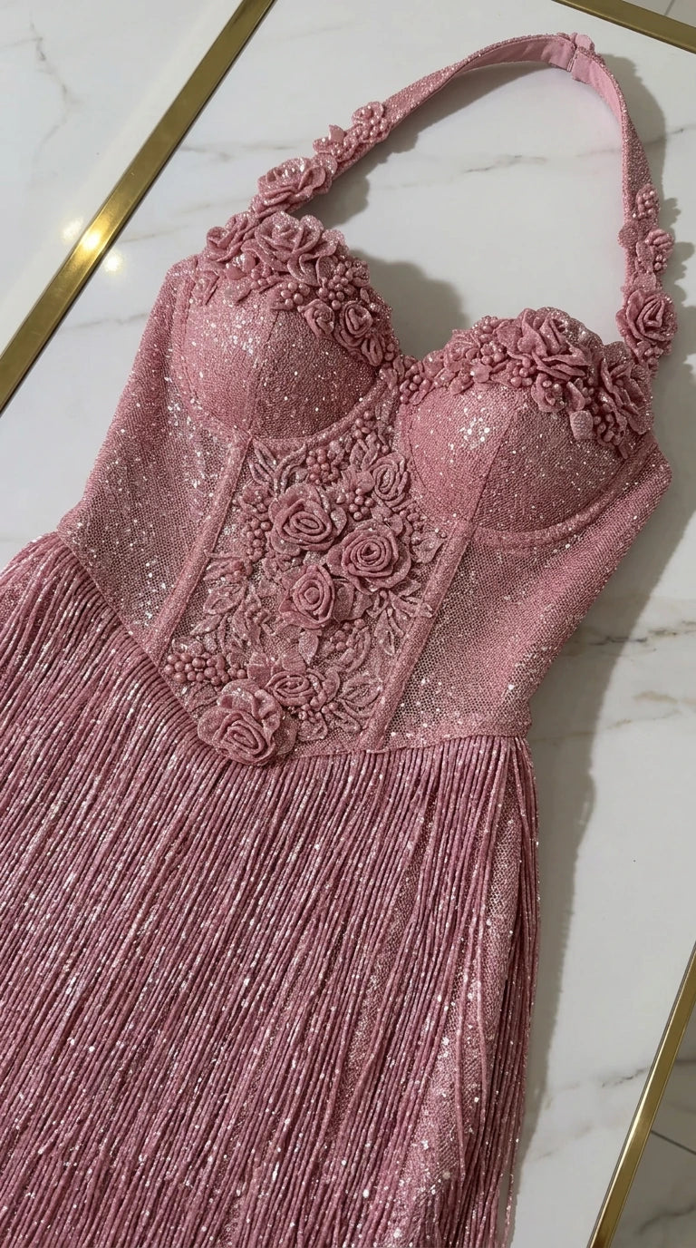 Close-up detail of 3D floral corset bodice and halter strap on Dusty Rose gown