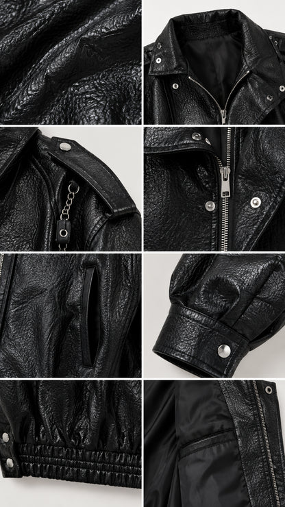 Close-up details of black faux leather texture, collar, shoulder epaulettes, zipper, and lining