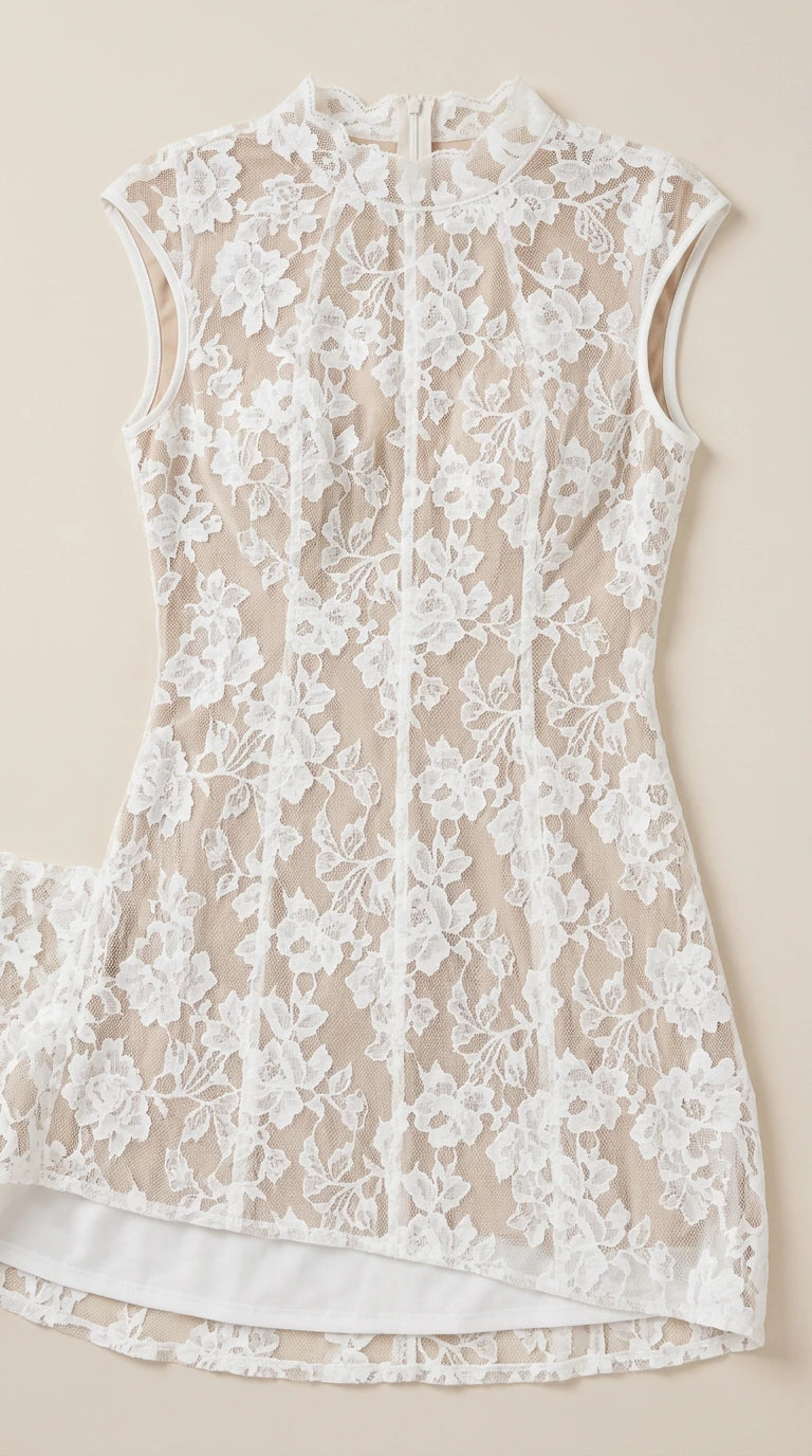 Close up flat lay detail of white floral lace bodice and lining