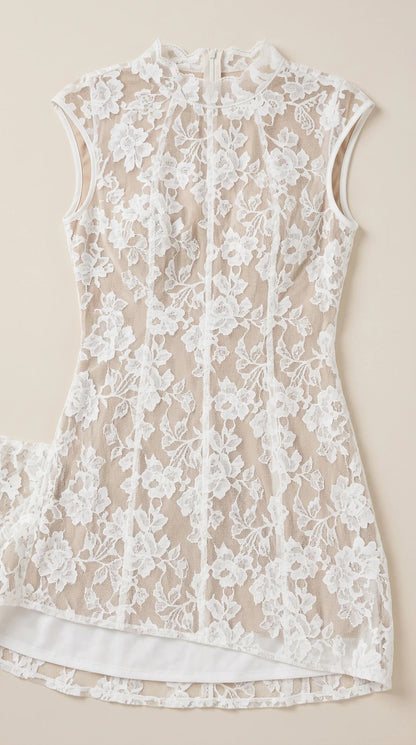 Close up flat lay detail of white floral lace bodice and lining