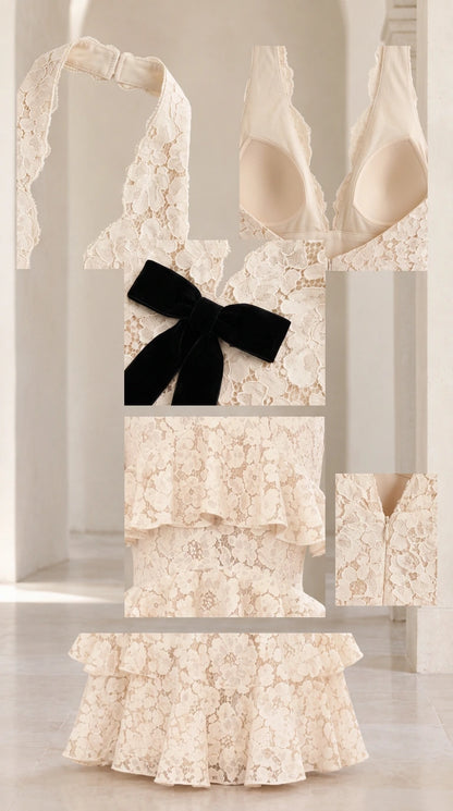 Close-up details of cream lace fabric, halter collar, padded bust, velvet bow, and zipper closure