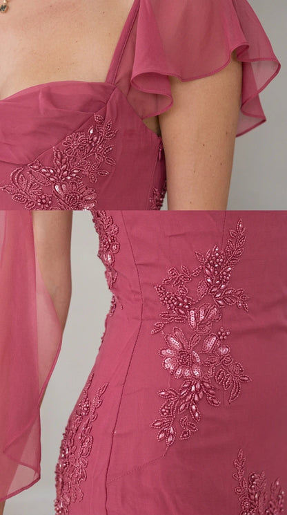 Close-up detail of bodice beadwork, floral embroidery, and sheer chiffon flutter cap sleeve