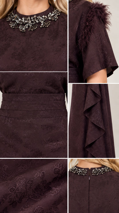 Close-up details of crystal beaded collar, feather shoulder trim, floral jacquard weave, and side ruffle
