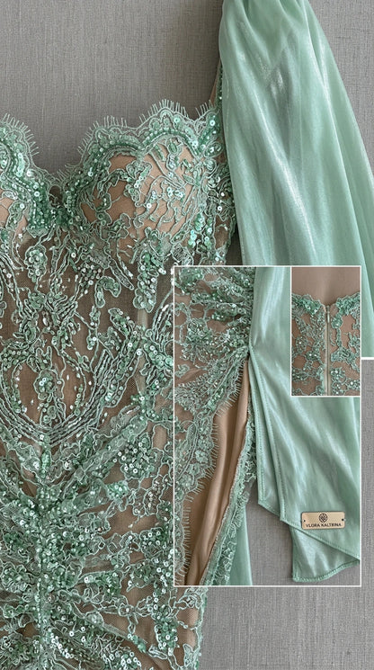 Close-up detail of mint green sequin lace embroidery and sweetheart neckline