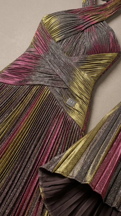 Close-up detail of crisscross pleated bodice and metallic fabric texture