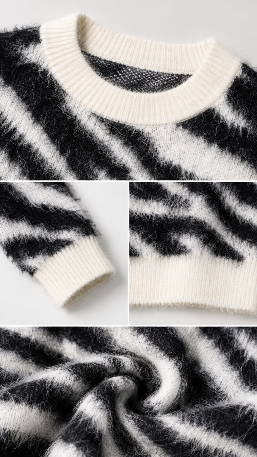 Detailed close-up view of ribbed neckline, cuffs, hem, and plush fuzzy knit texture