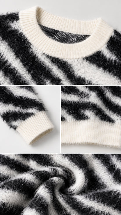 Detailed close-up view of ribbed neckline, cuffs, hem, and plush fuzzy knit texture