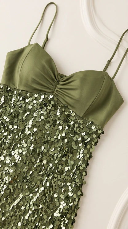 Close-up detail of the gathered satin sweetheart bustier and olive green sequins