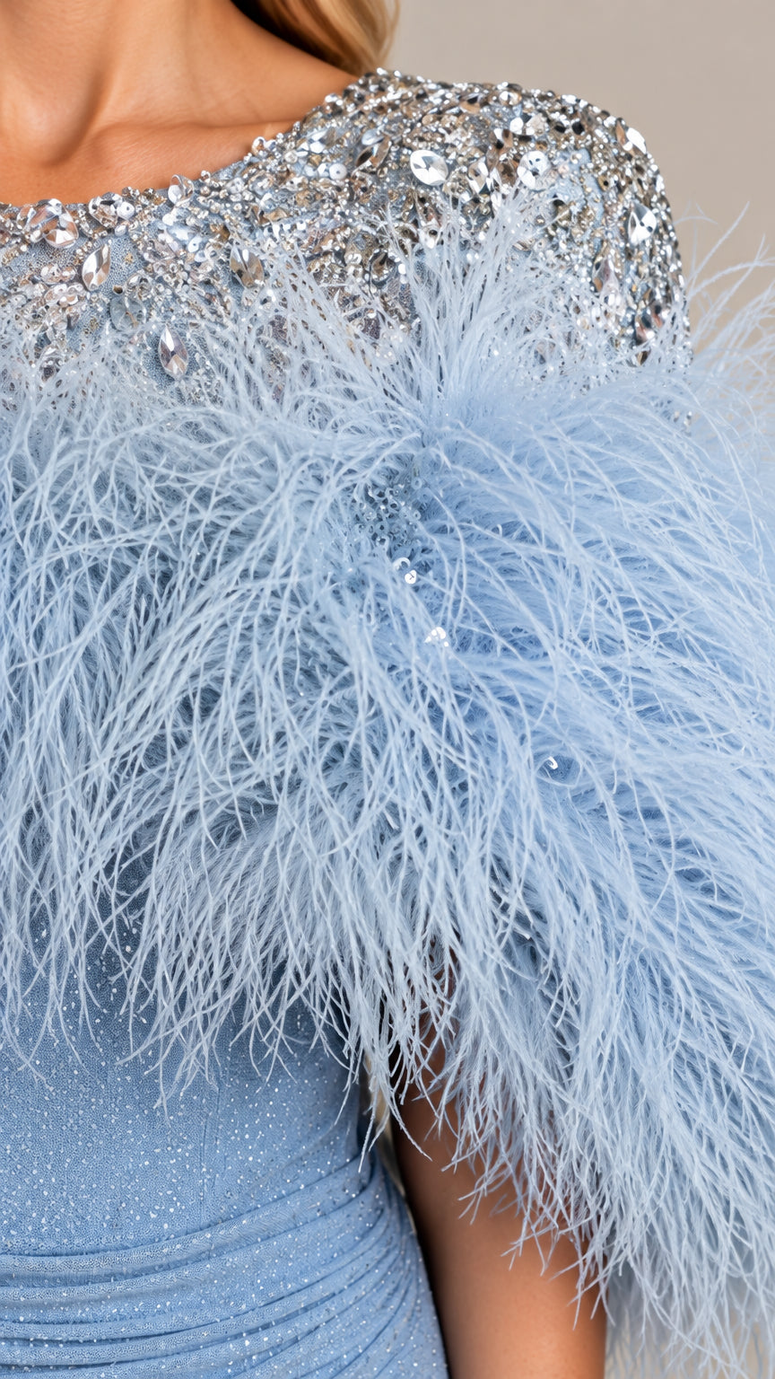 Close-up detail of silver sequin yoke and plush sky blue feather trim