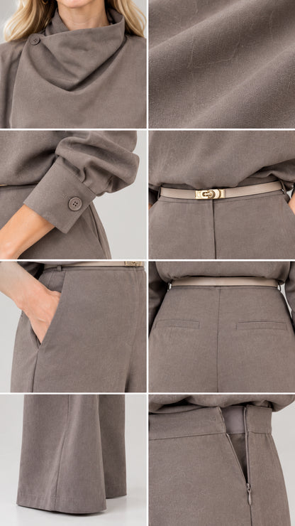 Close-up details of cowl neck, woven fabric, button cuff, belt buckle, pocket, and zipper
