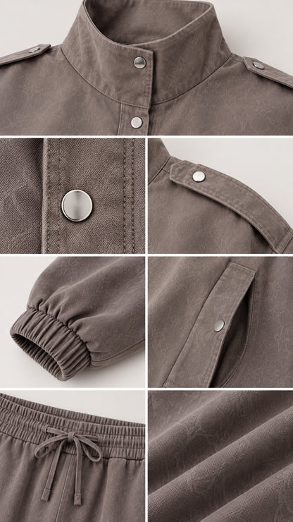 Close-up details of collar, snap buttons, shoulder tabs, cuffs, and drawstring