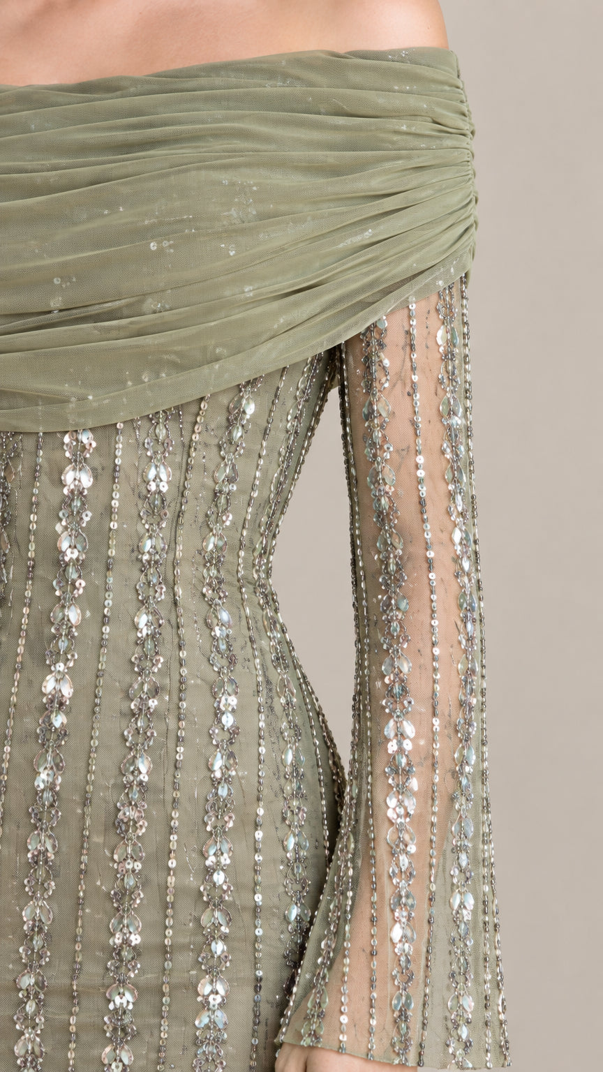 Close-up of Sage Green gathered off-the-shoulder neckline and linear sequin fabric