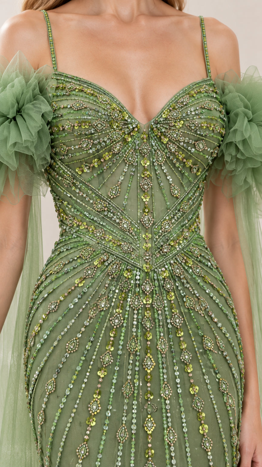 Close-up detail of intricate beadwork and sweetheart neckline on sage green gown