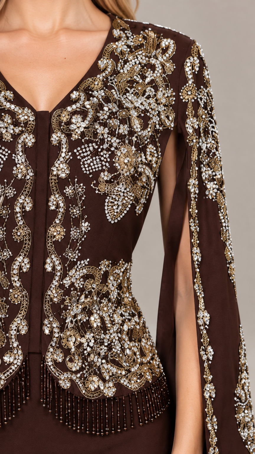 Close-up detail of intricate gold beadwork, sequins, and fringe on the gown bodice