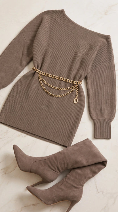 Flat lay of taupe off the shoulder ribbed knit dress with gold chain belt and matching boots