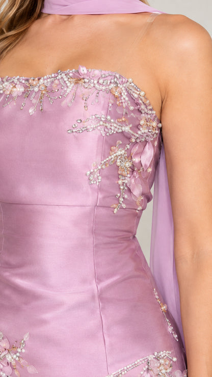 Close-up detail of delicate floral beading and embroidery on strapless neckline