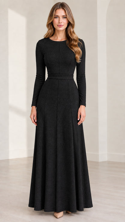 Front view of woman wearing Black long sleeve A-line maxi dress