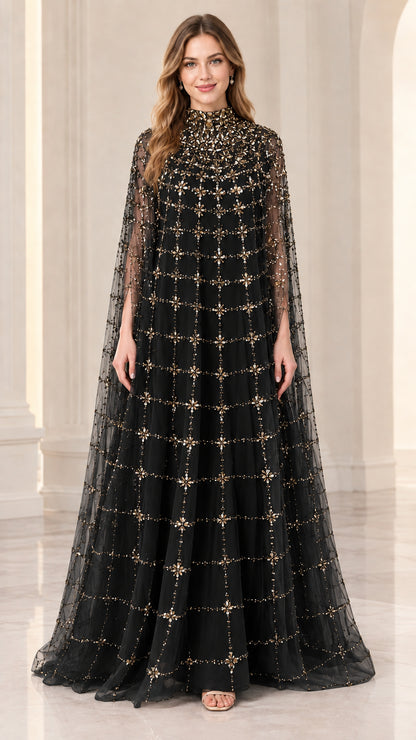 Front full view of woman wearing black beaded cape evening gown