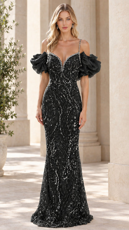 Front view of the black beaded mermaid formal dress with dark ruffled sleeves