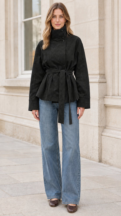 Full front view of model wearing black high neck belted faux suede jacket