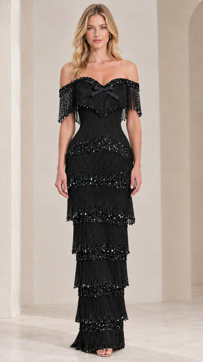 Front view of black off-shoulder tiered fringe maxi evening dress