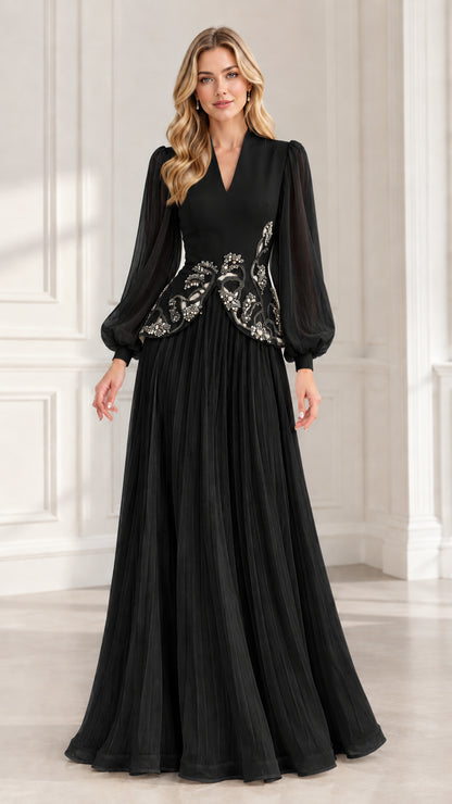Black long sleeve pleated evening gown with silver-tone beaded waist accent
