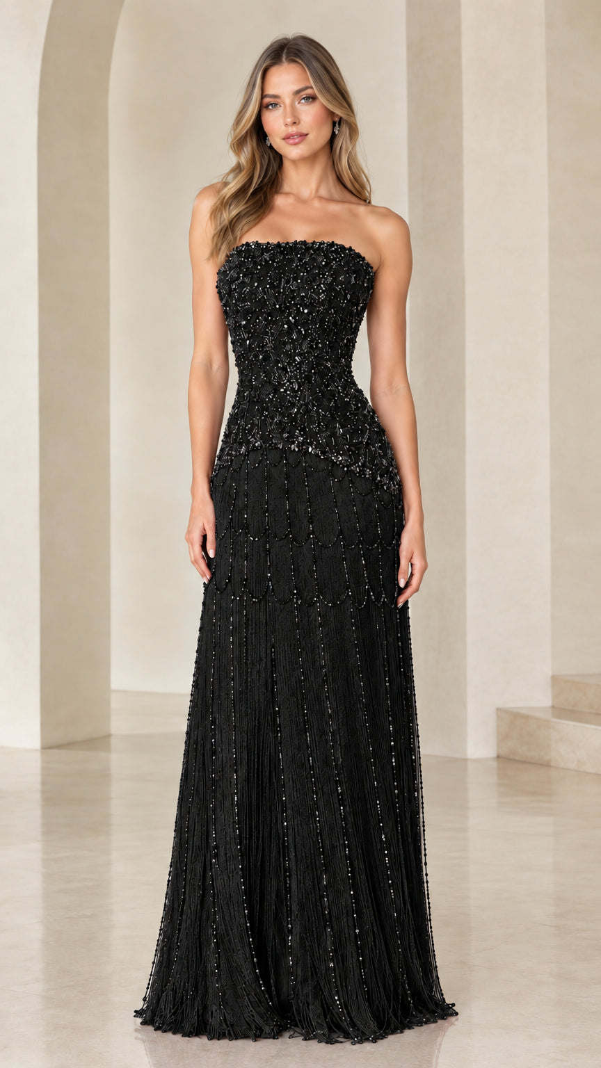 Strapless black beaded bodice evening maxi gown with cascading fringe skirt