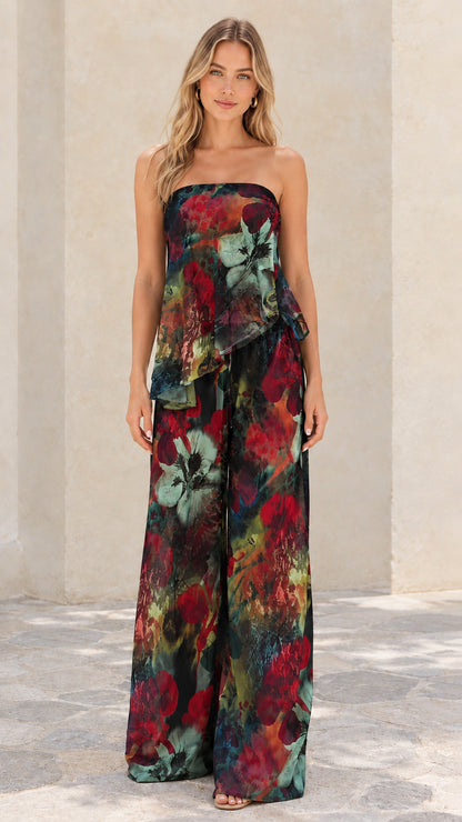 Front view of black multi floral strapless tiered wide-leg two-piece set