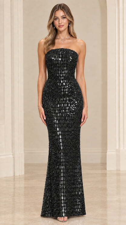 Front view of model wearing Black strapless sequin evening gown