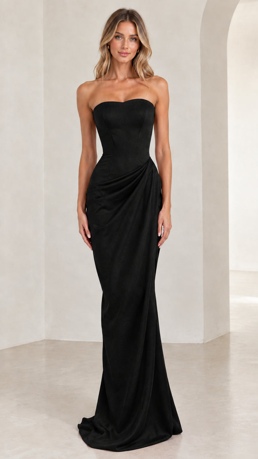Model wearing classic black strapless draped maxi formal evening gown