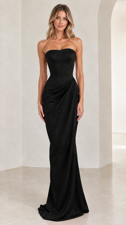 Model wearing classic black strapless draped maxi formal evening gown