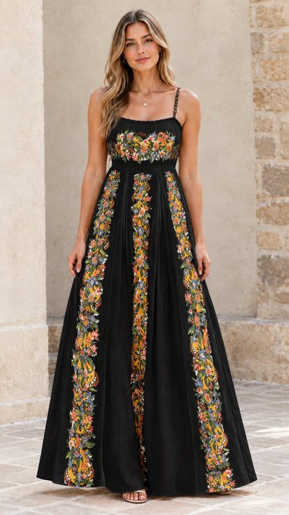 Full-length view of black floral pleated maxi dress
