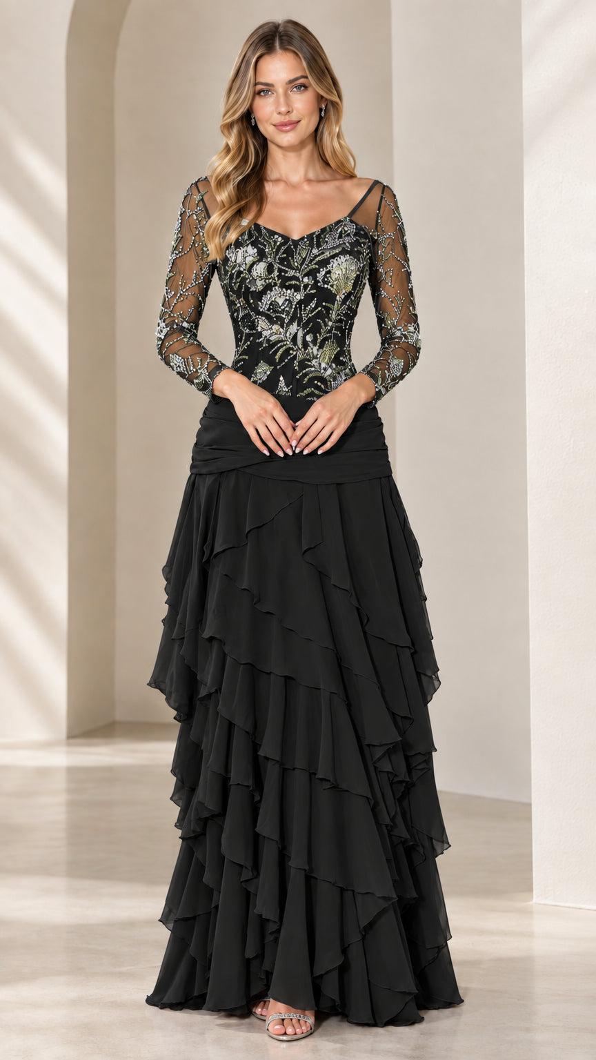 Front view of Black long sleeve formal evening gown with tiered chiffon skirt