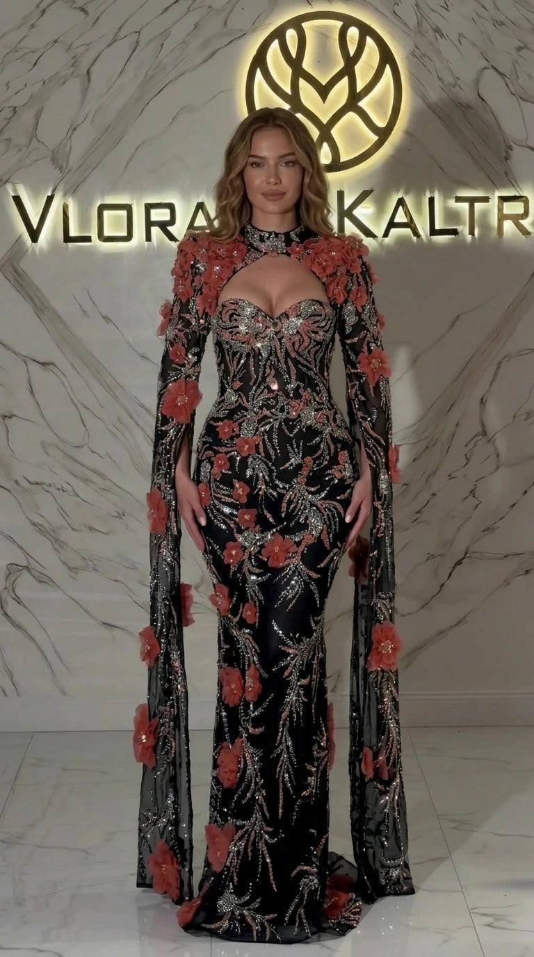 Black embroidered cape evening gown with blush pink 3D flower details