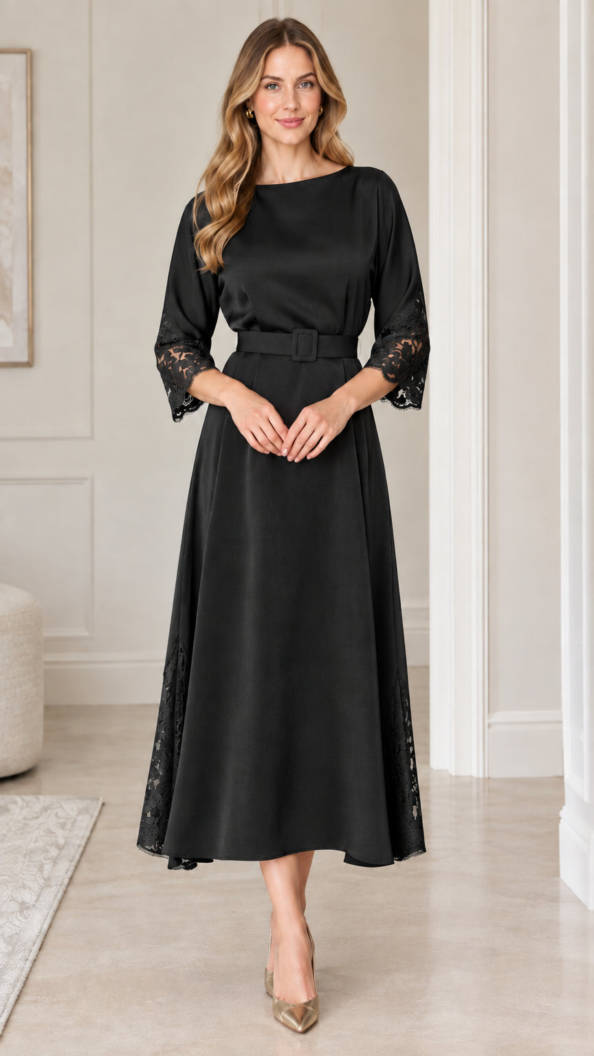Full front view of black belted A-line midi dress with lace sleeves
